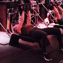 Woman exercising on a weight bench